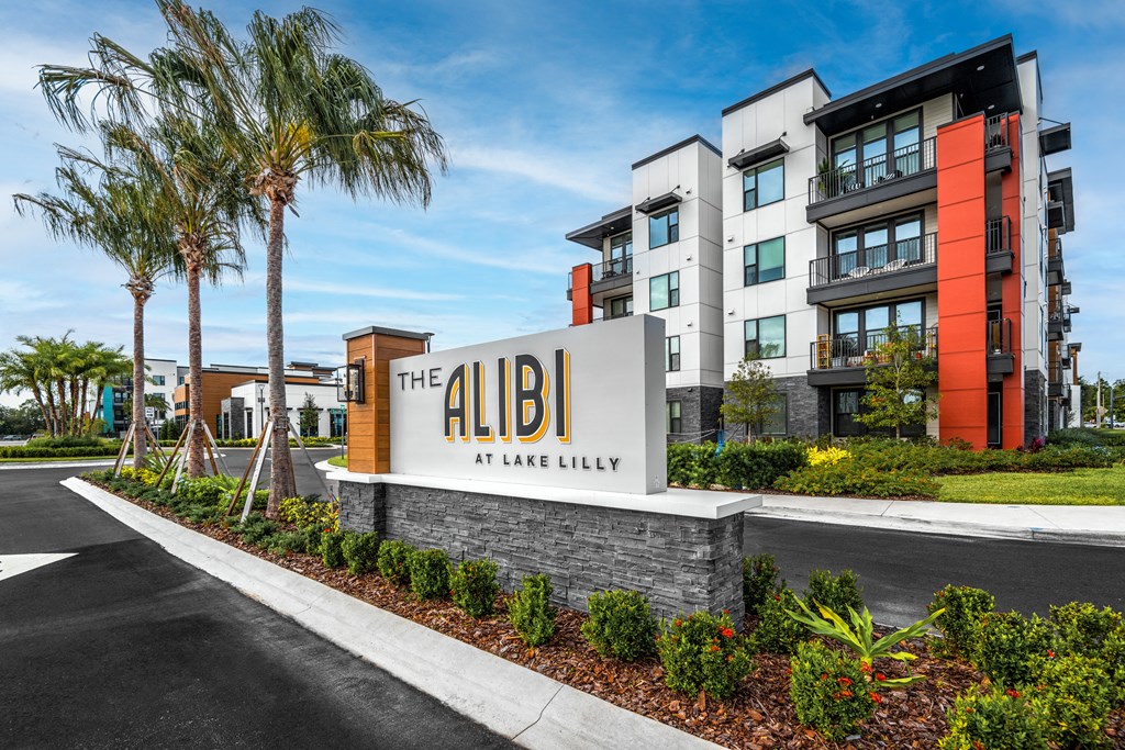 the albi at lakeshore apartments sign in front of building