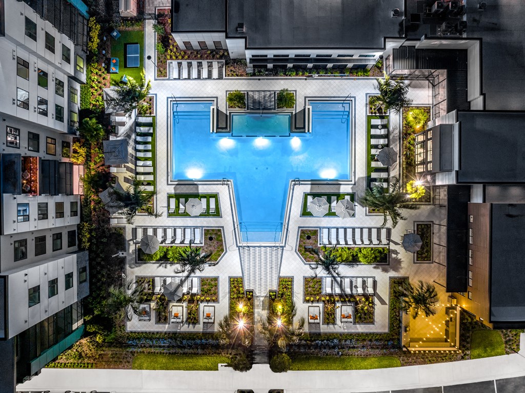 a birds eye view of a hotel with a pool in the middle of a building at The Alibi at Lake Lilly, Ocoee, FL