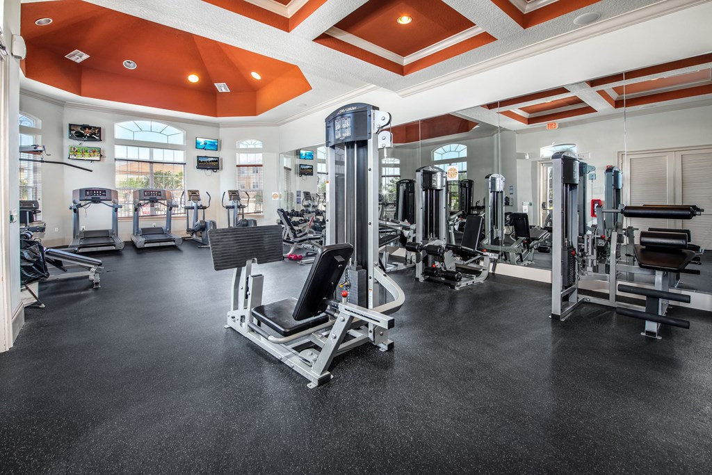 Gym with weights equipment at Rapallo Apartments  in Kissimmee, Florida