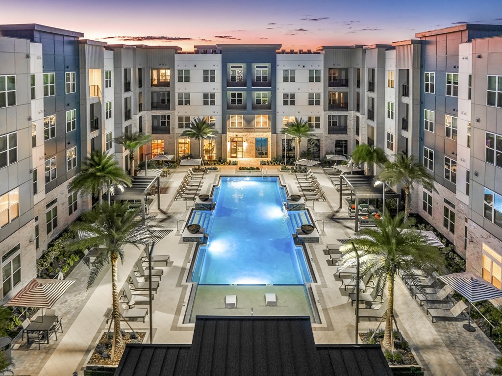 an overhead view of an apartment building with a swimming pool at The Overlook, Winter Garden