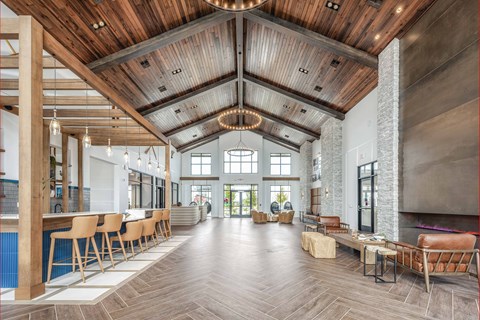 A large open space with wooden floors and a high ceiling.