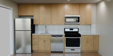A kitchen with wooden cabinets and stainless steel appliances.