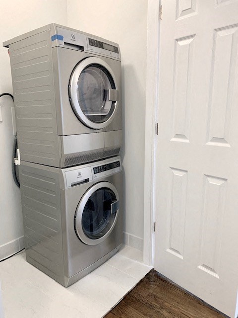 A stack of two front loading washing machines.
