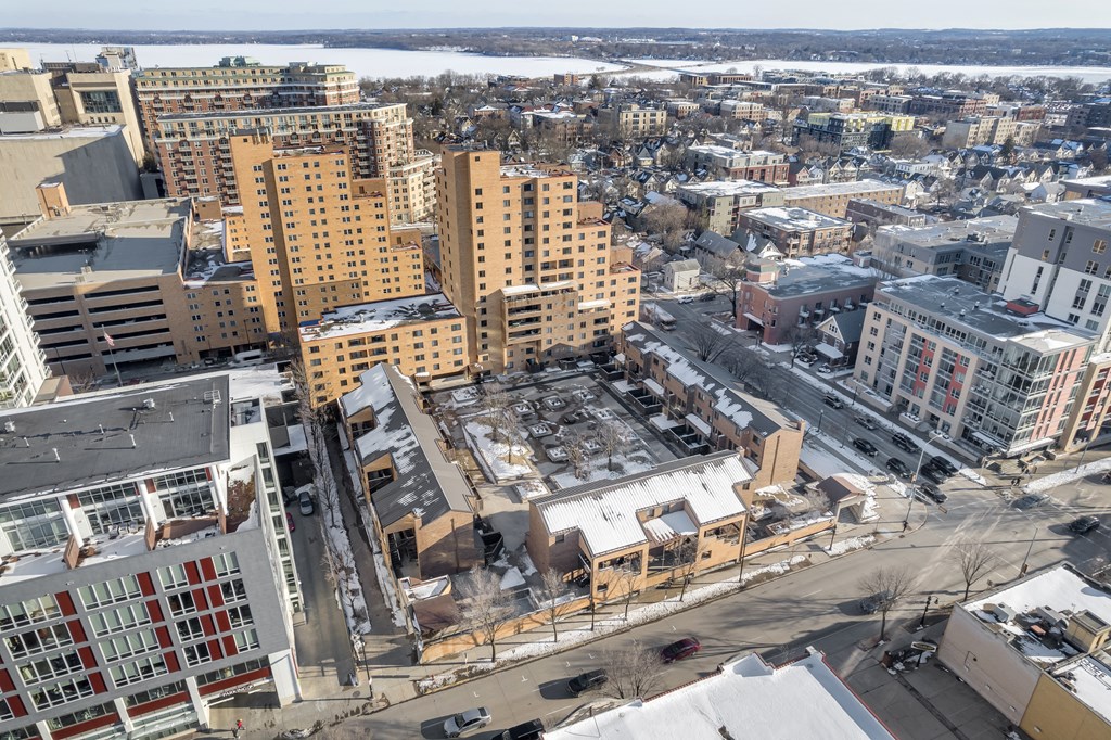 a view of the city from above in the winter