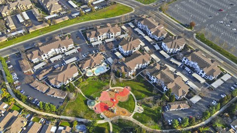 Aerial view of playground and courtyard amenities at Geneva Pointe Apartments, Elk Grove, CA 95624