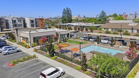 Poolside amenity area with recreational facilities at Anton Arcade Apartments, California, 95825