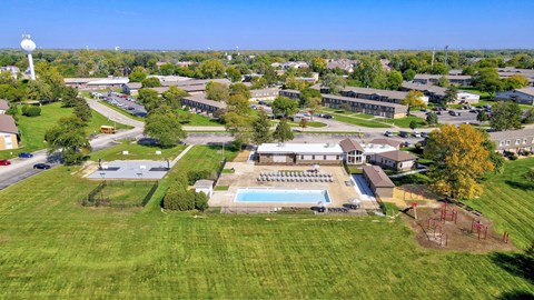Aerial view of community pool and recreation area at Photo Gallery Apartments, Willowbrook, Illinois