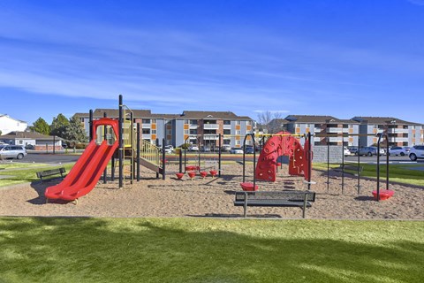 Playground with Red Slide at Fox Crossing Apartments, Denver, 80231