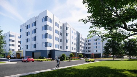A modern apartment building with a red car parked in front at Rivo Apartments, Sacramento, CA, 95815