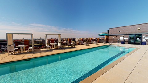 Rooftop pool deck with cabanas and city views at Photo Gallery Apartments, Willowbrook, 60527