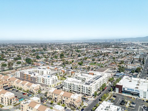 A cityscape with a clear blue sky above.