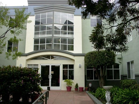 A building with a glass window and a white door.