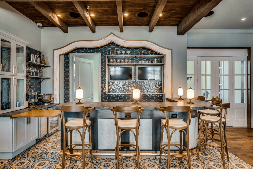 Brass bar and barstools in Clubroom Bar
