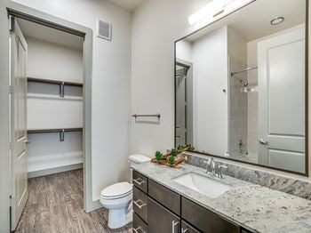 Granite countertops in kitchens and marble or granite in bathrooms