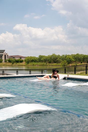 Ozone-Filtered Split-Level Pool with Cascading One-Story Waterfall