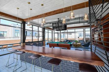 Rooftop terrace club with wrap-around outdoor deck