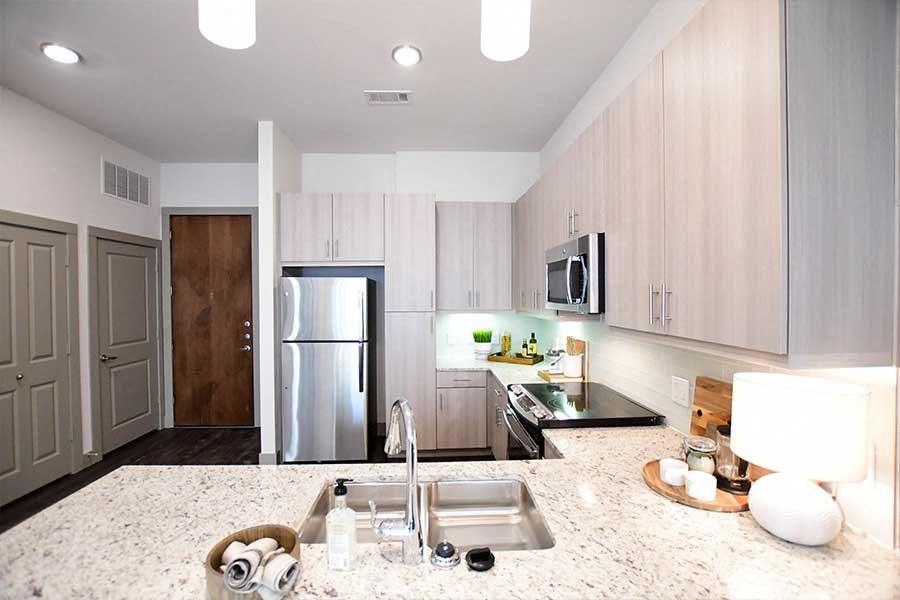 Custom kitchens with granite and tile backsplash