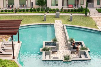 Ozone-filtered pool with recessed alcove seating