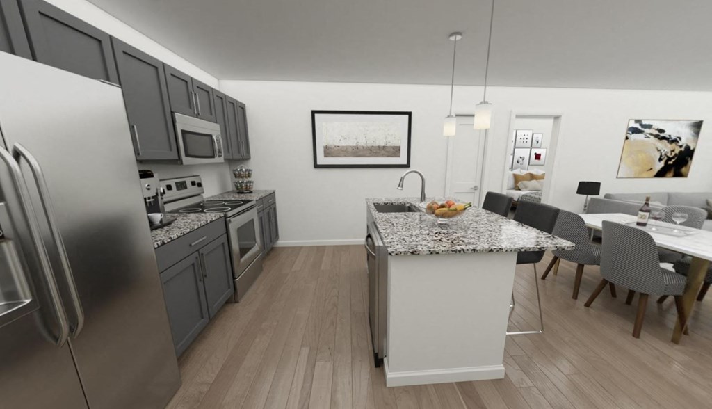 a kitchen and dining area in a 555 waverly unit