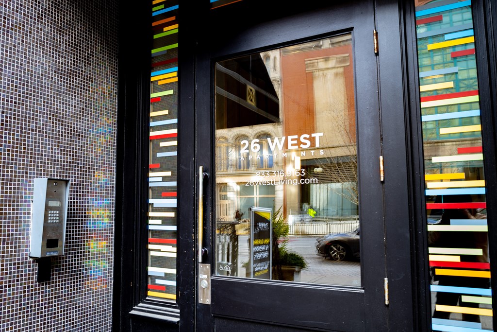 the door to the 25 west boutique at 26 West, Managed by Buckingham Urban Living, Indianapolis