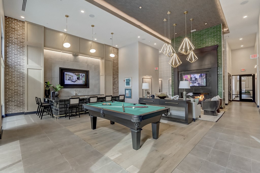 play a game of pool in our clubhouse at our apartments