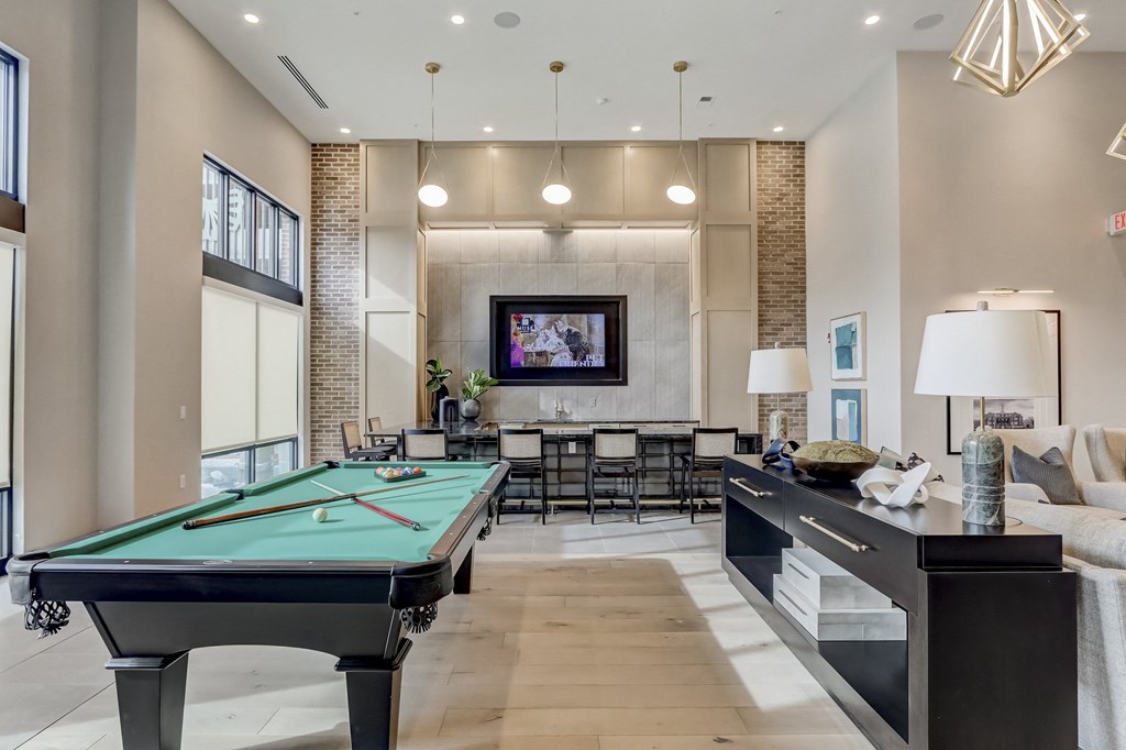 pool table in clubhouse at the estates apartments