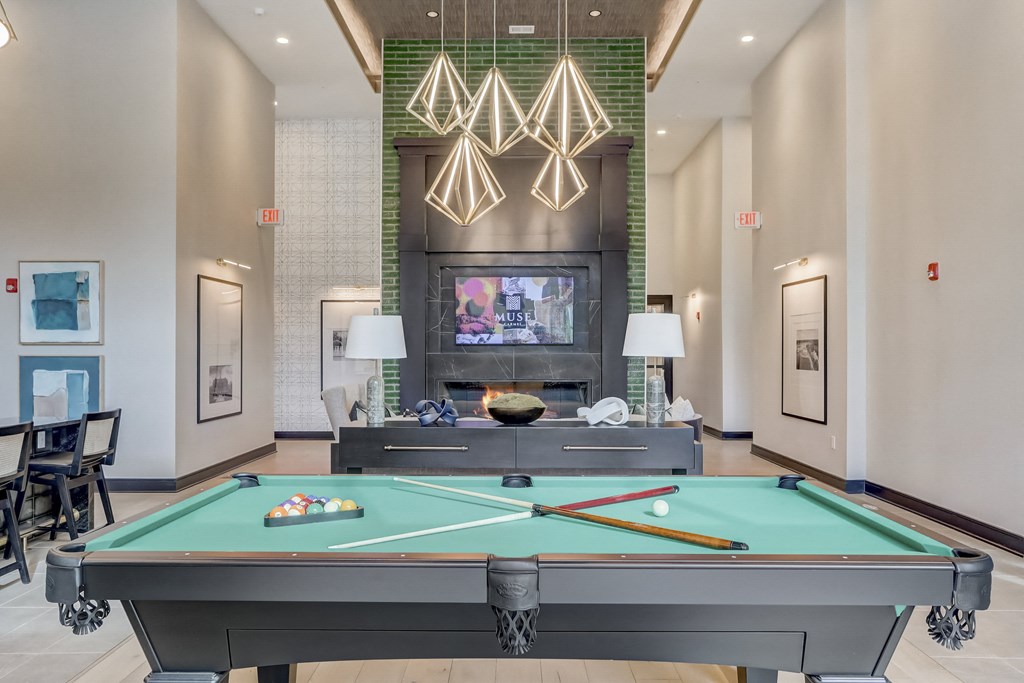 play a game of pool in our clubhouse at our apartments