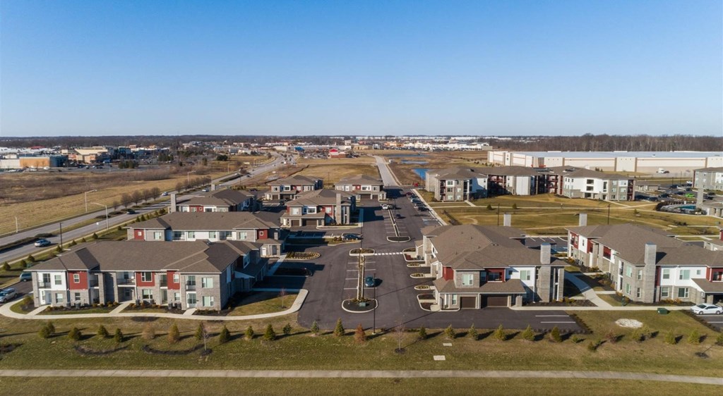 an aerial view of a neighborhood with houses and a road at Echo Park at Perry Crossing Apartments, Plainfield, 46168
