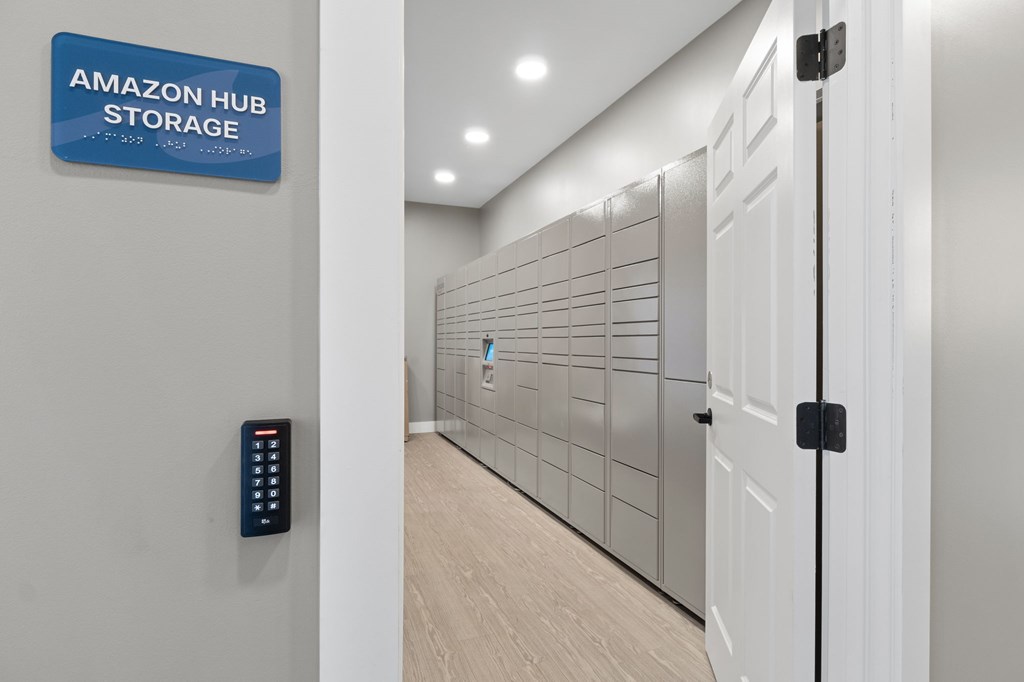 A hallway leading to a storage room with a sign that says Amazon Hub Storage.