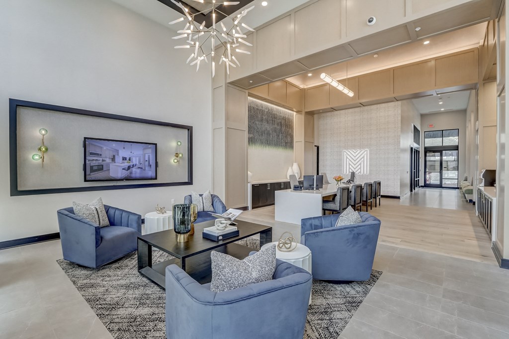 a living room with couches and a coffee table