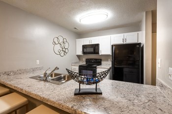 Granite Countertop Kitchen Granite Countertop Kitchen at The Summit at Avent Ferry, Raleigh, 27606 - Photo Gallery 4