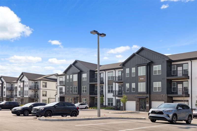 Nook Nine apartment buildings with surface parking and garages