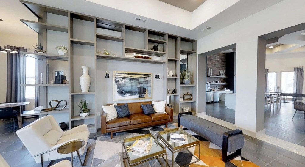 a living room with a couch and a table at Echo Park at Perry Crossing Apartments, Indiana
