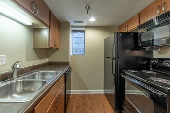 Upscale Stainless Steel Appliances at The Ambassador at Library Square, Indianapolis, IN