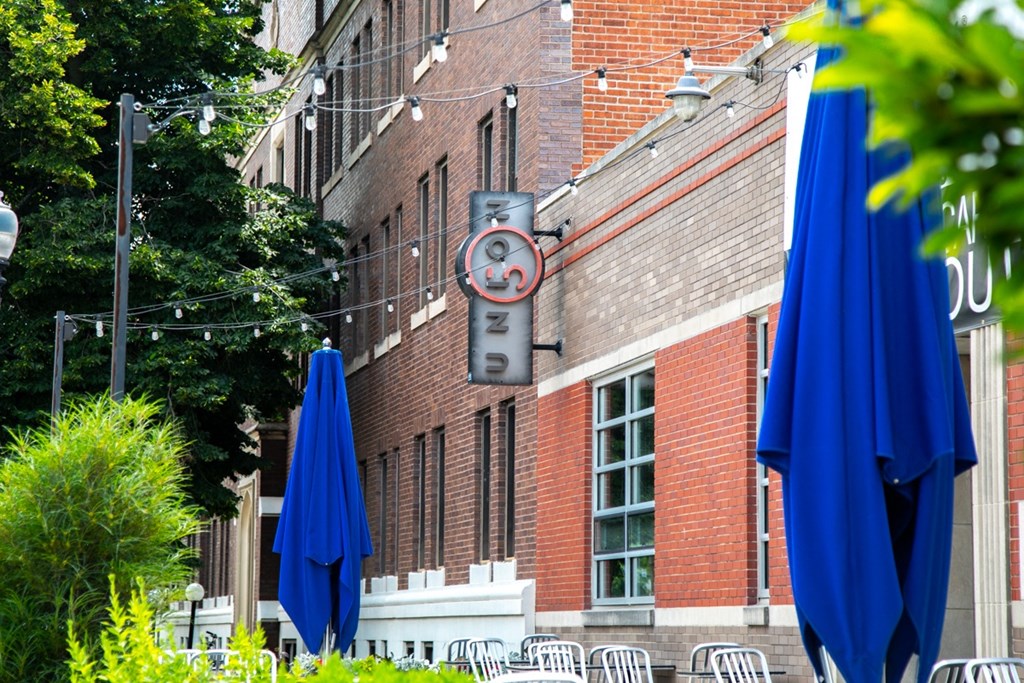 Street view from sidewalk of nearby popular restaurant at The Argyle on Mass Ave, Indiana