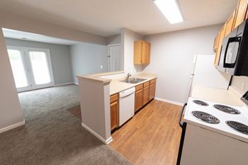 Electric Range In Kitchen at Autumn Oaks, New Castle, 47362