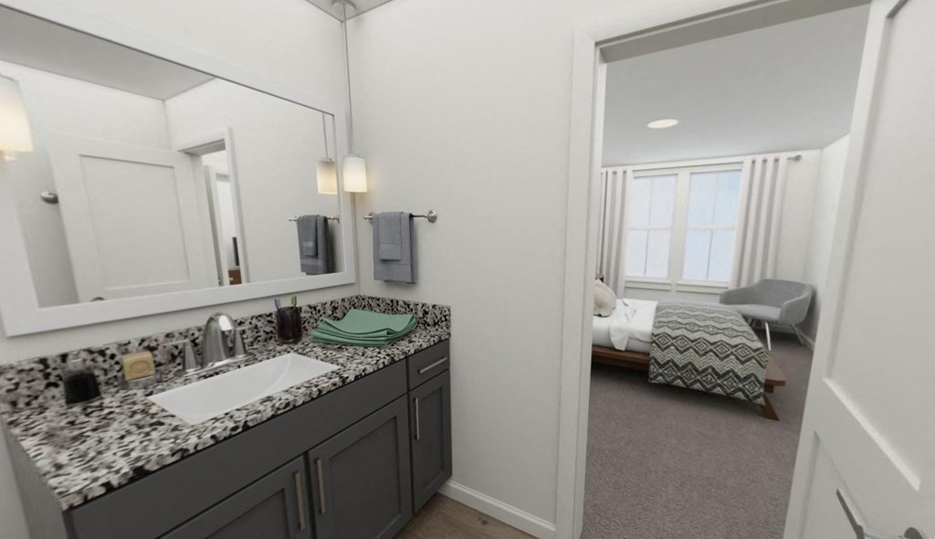 a bedroom with a bed and a mirror