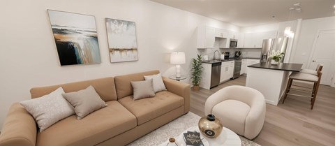 A living room with a brown couch and a coffee table.