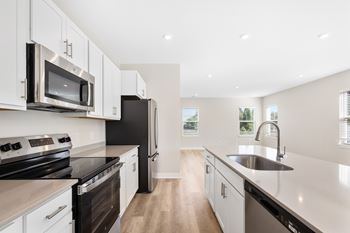 Kitchen With Black Appliances at Mural Lewis Center, Ohio
