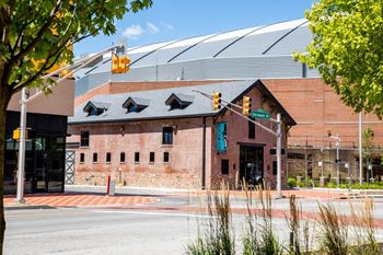a red brick building with a large dome on top of it at CityWay Apartments, Indiana 46204