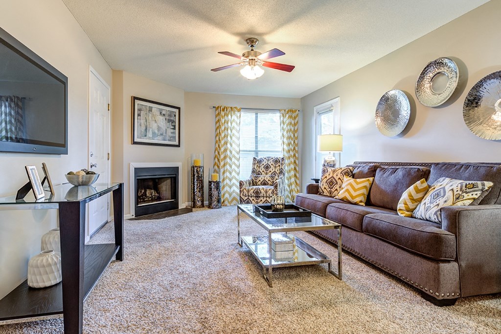 Living Room With Fireplace at Canter Chase Apartments, Louisville, KY, 40242