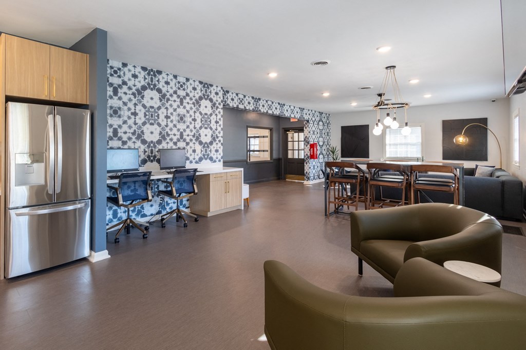 an open living room and kitchen with a dining room table and chairs