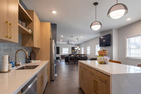 a kitchen with a large counter top and a sink