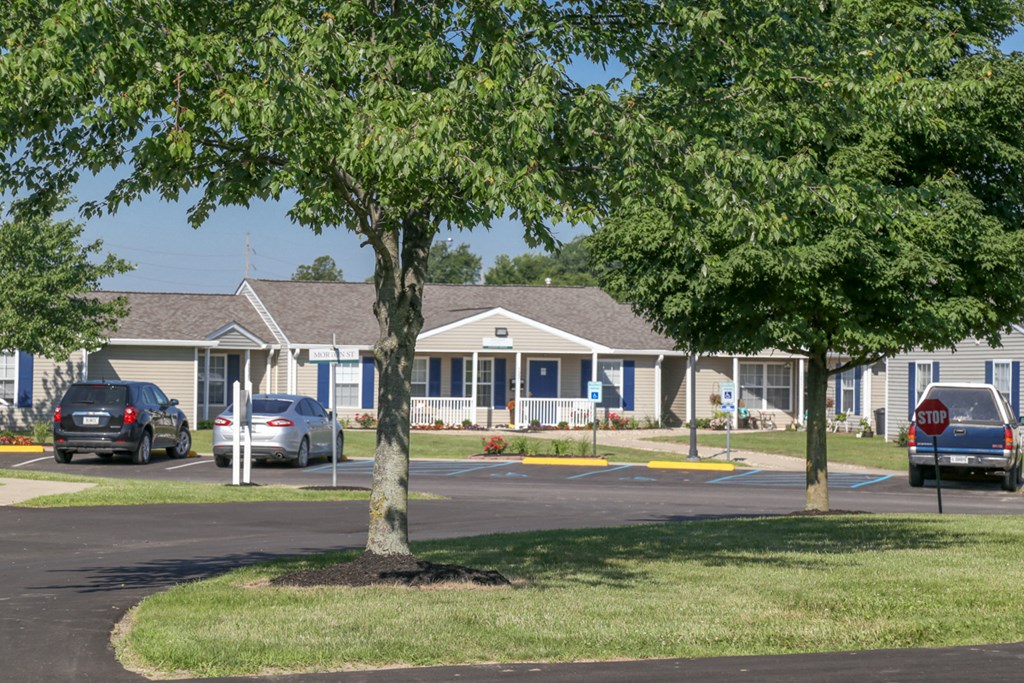 Entryway of Clubhouse with trees 