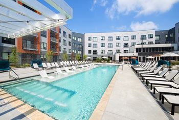 Pool Side Relaxing Area With Sundeck at Union Berkley, Kansas City, MO