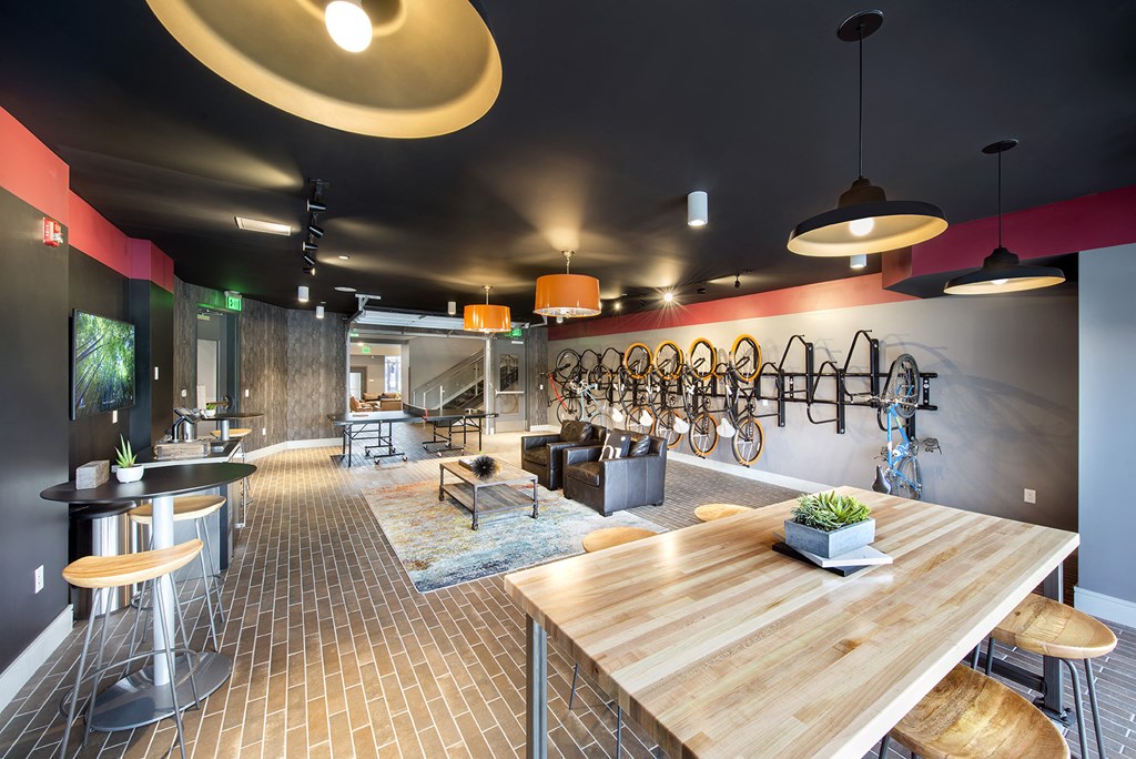 The Bike Lounge featuring Storage w/ Repair Tools, Stands, TVs, Post Work-Out Relaxation Area & Ping Pong at Union Berkley, Kansas City