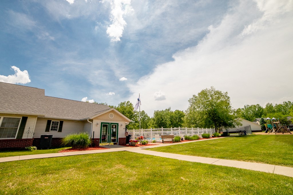 a house with a yard in front of it