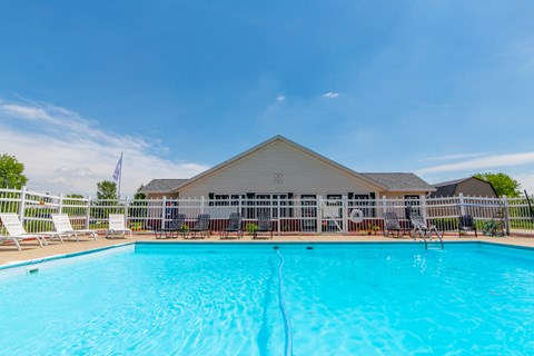 the pool at the whispering winds apartments in pearland, tx