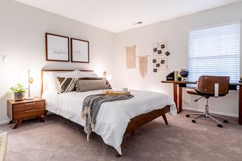 Bedroom with cozy bed at The Reserve at Williams Glen, Zionsville, IN, 46077