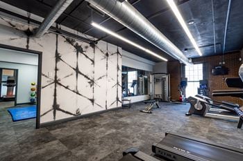 24-Hour Multi-Level Cardio And Weightlifting Center at Harness Factory Lofts and Apartments, Indianapolis, IN
